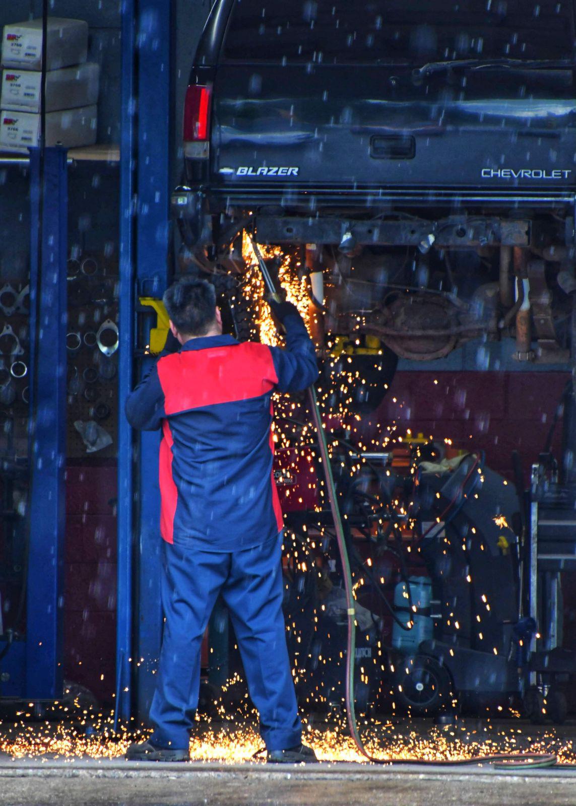 Mechanic working on a vehicle